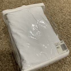 white bedding protector