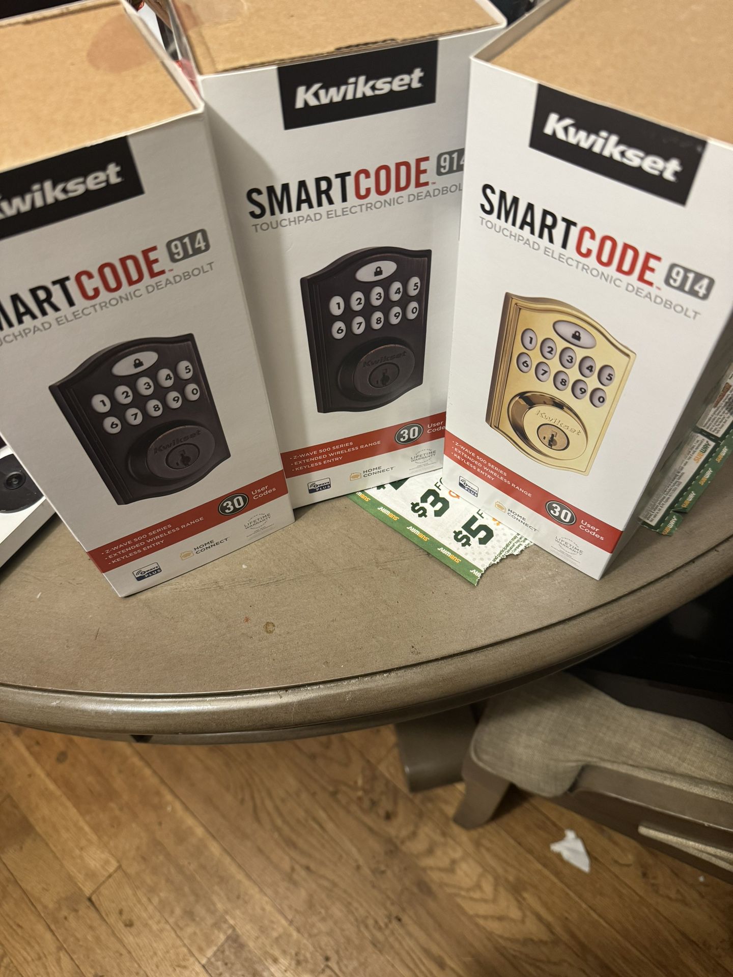 Kwikset Smart Locks Gold and Chocolate Color