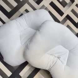 Instead of two white economic sleeping pillows