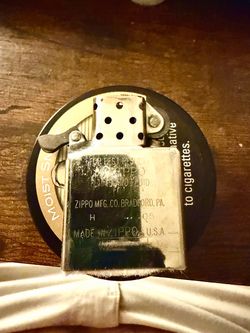 21 year old Zippo lighter, works great.
