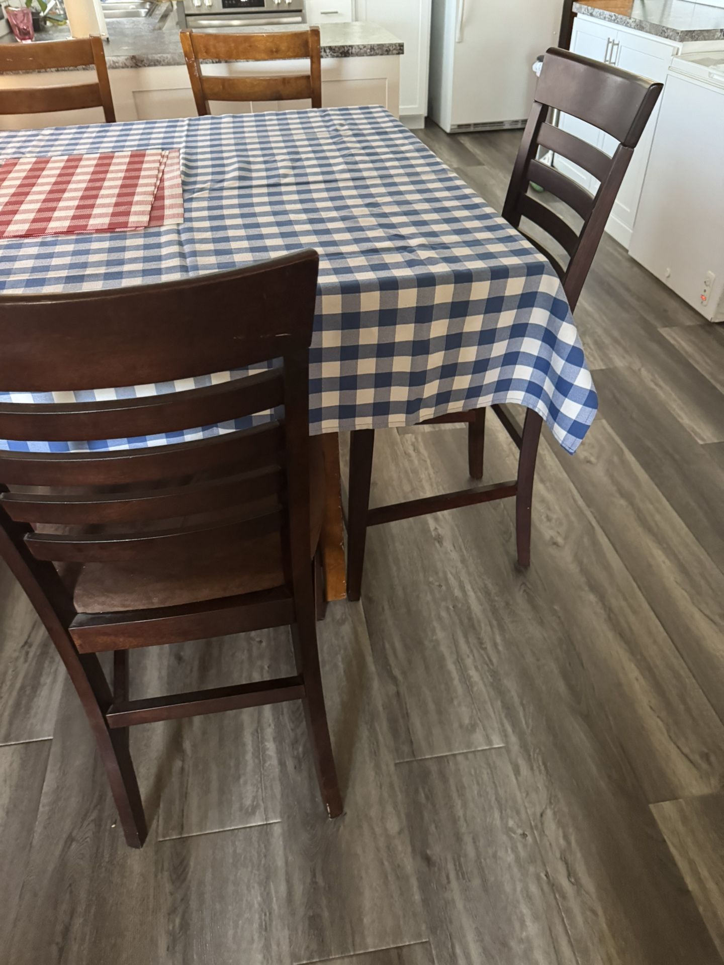 Wooden Dining Table With Four Chairs In Good Condition