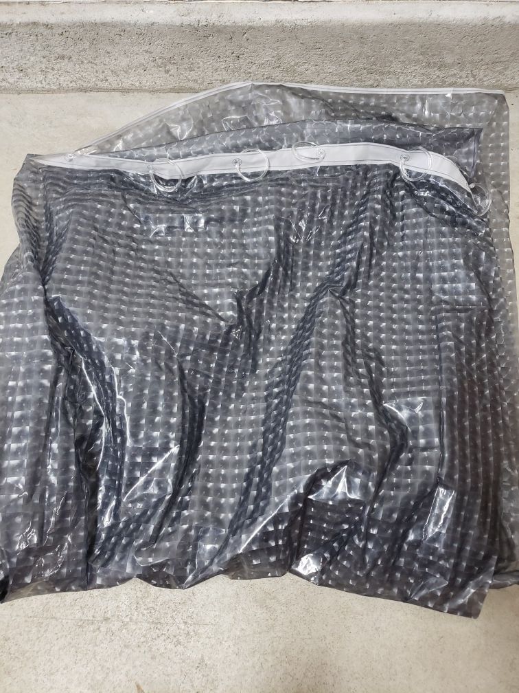 Shower curtain with hooks