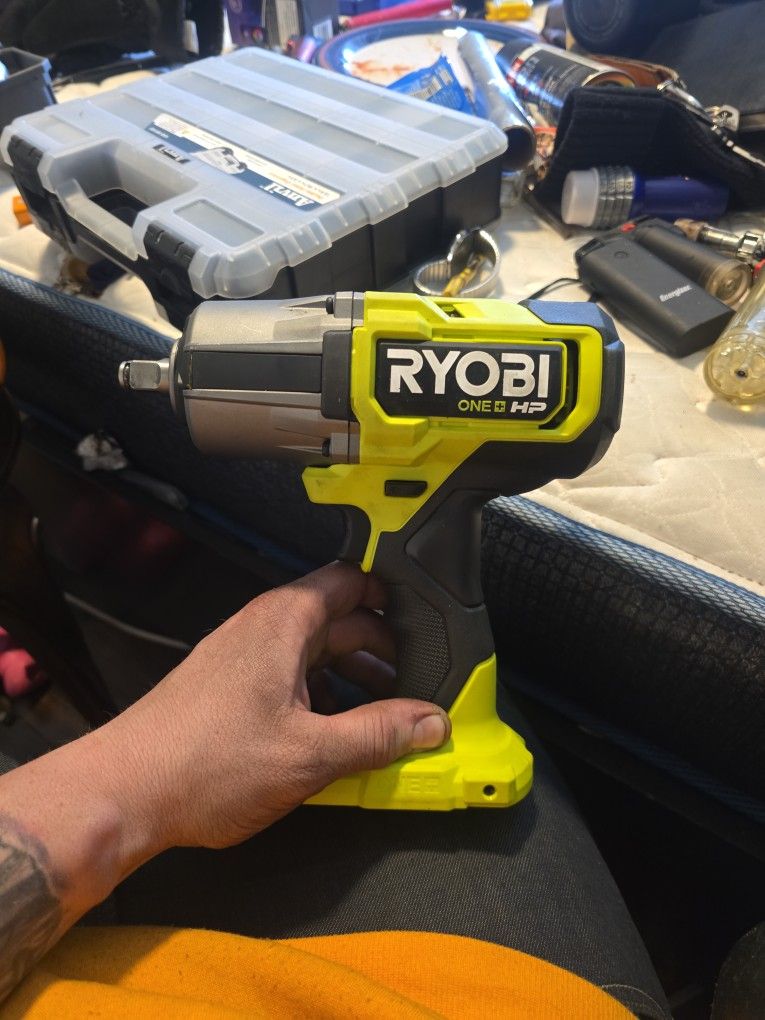 BRAND NEW!!!RYOBI impact drill with battery in charger
