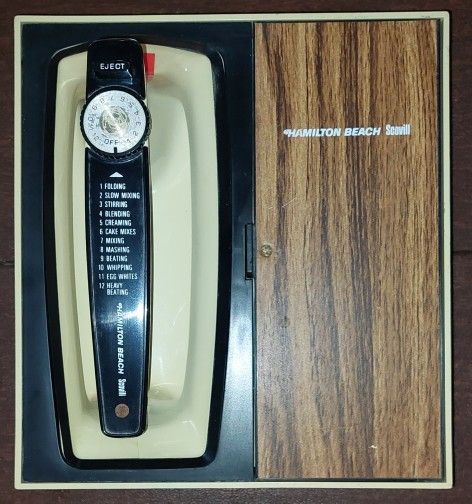 Vintage Hamilton Beach Scovill Harvest Gold Wall Mount Hand Mixer Model 91-3. Works! One owner.
Compact & convenient. Mixer, Power Cord, 2 Beaters in