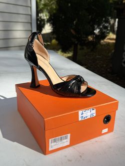 Black leather high heels with 4.5" heel Size 7 