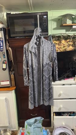 LOWERED AGAIN.    Woman’s long hooded light long sleeve sweater