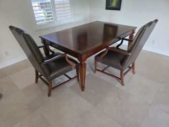 Dining table and leather chairs
