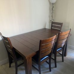 Wood Dinning Table (42”x 64”) w/ 4 Chairs