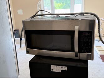 Wall mount build in microwave