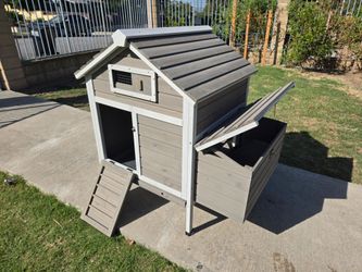 Chicken coop with nesting boxes