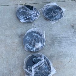 Very nice looking Brand new 45, 35 lb, and 25 lb Olympic weight plates.  Pair of 45s =$110 Pair of 35s=$90 Pair of 25s=$80