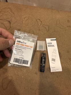 Olight mini 2 with deep carry clips