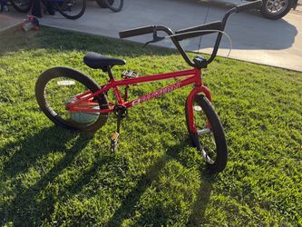 Red BMX pay dirt bike 20’