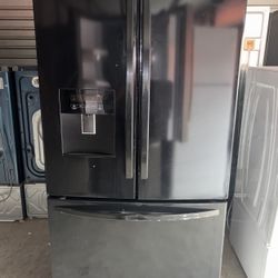 Black Kenmore Refrigerator And Freezer