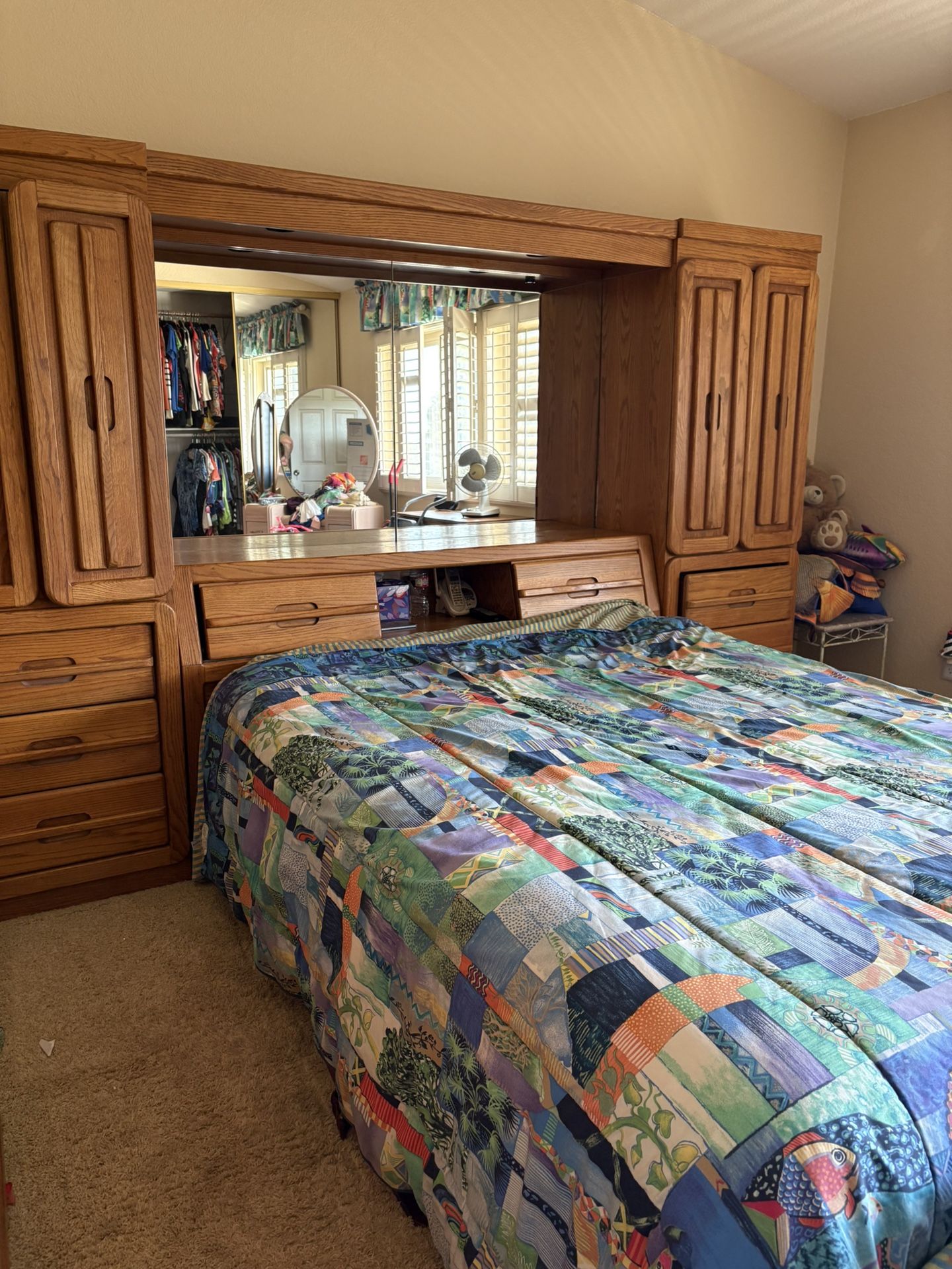 Free Solid Oak Bedroom Wall Unit with Mirrored Headboard & Storage