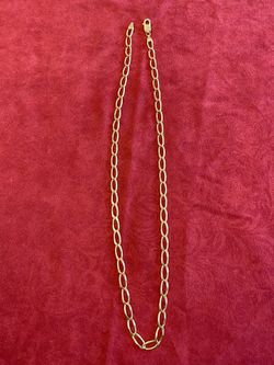 14k chain about 22 inches long and 23 gr