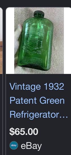 Vintage 1932 Green glass water bottle !