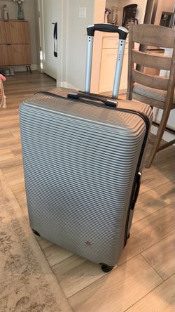 32” Checked Luggage