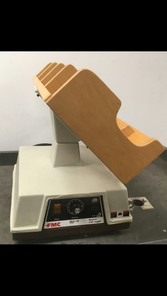 Syntron J-50-B Paper Jogger w/4 pocket tilt rack