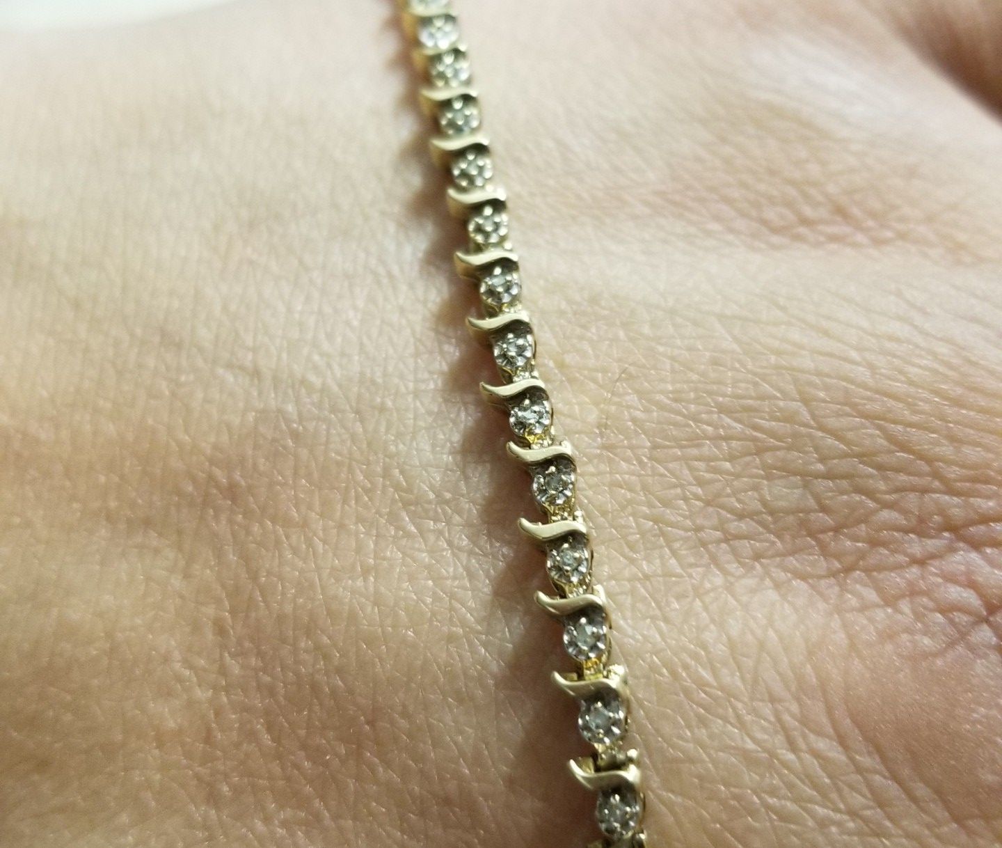 DAIMOND BRACLET WITH GOLD