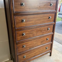 New Classic Home Furnishing Inc. 5 Drawer Tall Walnut Dresser