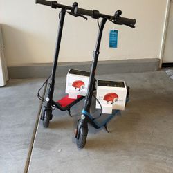 Two Segway Electric Scooters For Kids & Teens With Brand New Helmets And Chargers