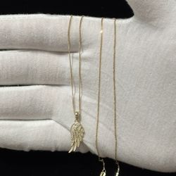 Solid 10k Cuban chain with Moissanite angel wing pendant