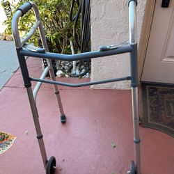 Walker With Sliders Attached 