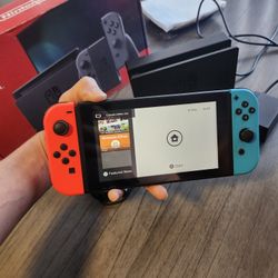 Nintendo Switch with Assorted Color Joy-Con Controller