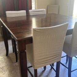 Wood Dining table With Leaf Insert And 6 Chairs (with Covers)  And a Matching Wood Credenza