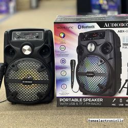Elevate Your Party: Rechargeable Bluetooth Speaker with Wired MIC and Tripod!