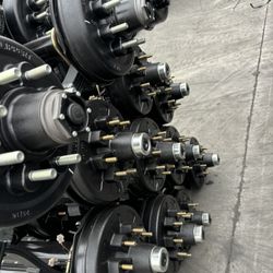 1 X 89 axle 5 on 4.5  axle with break and spring $340 