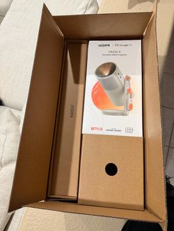 XGIMI MoGo 4 Portable Projector + PowerBase Stand brand new never been open.