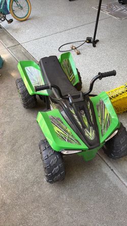 Kids ride on ATV