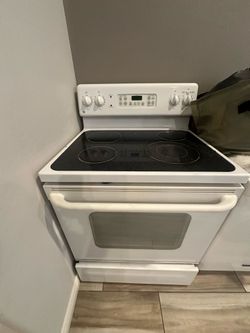 White GE Stove & White Maytag Dishwasher
