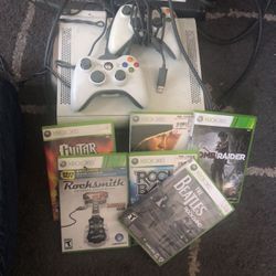 Xbox 360 with controllers and games