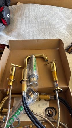 Brushed gold vanity faucet