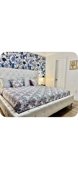 King bed with mattress, two nightstands, and two lamps