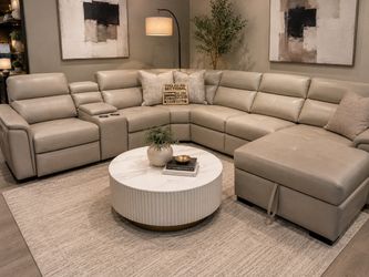 Modern Reclining sectional with pull out bed and storage chaise