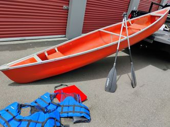 15 ft Coleman canoe life vest paddles included