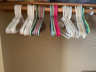 Adult  plastic  hangers  (10  counts  in  a  pack)  -  $3  a pack
