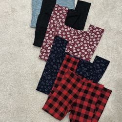 Set of Patterned and Solid Leggings (sz large, 10-12)