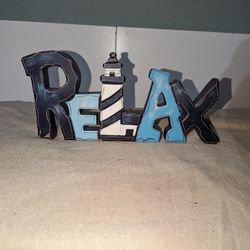 RELAX, ENJOY signs