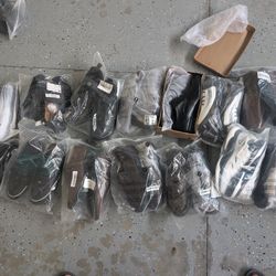 Various pairs of slipper shoes and sandals