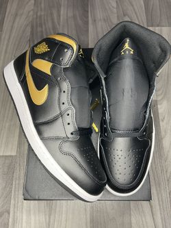 Black Metallic Gold Jordan 11s