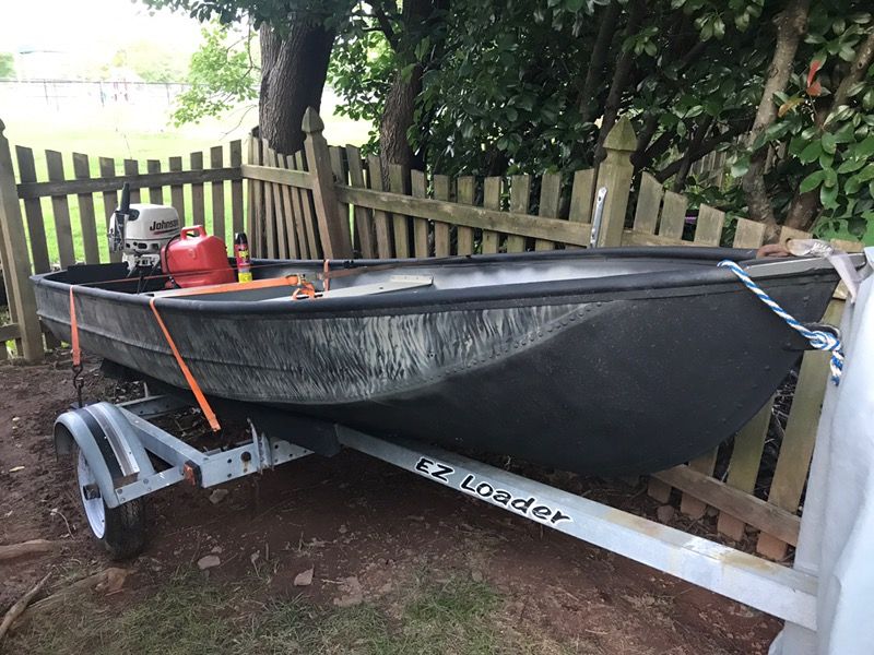 Sea King Boat with Johnson Motor and Trailor