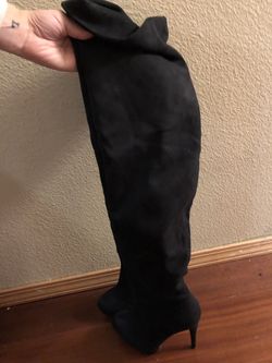 Thigh high black boots