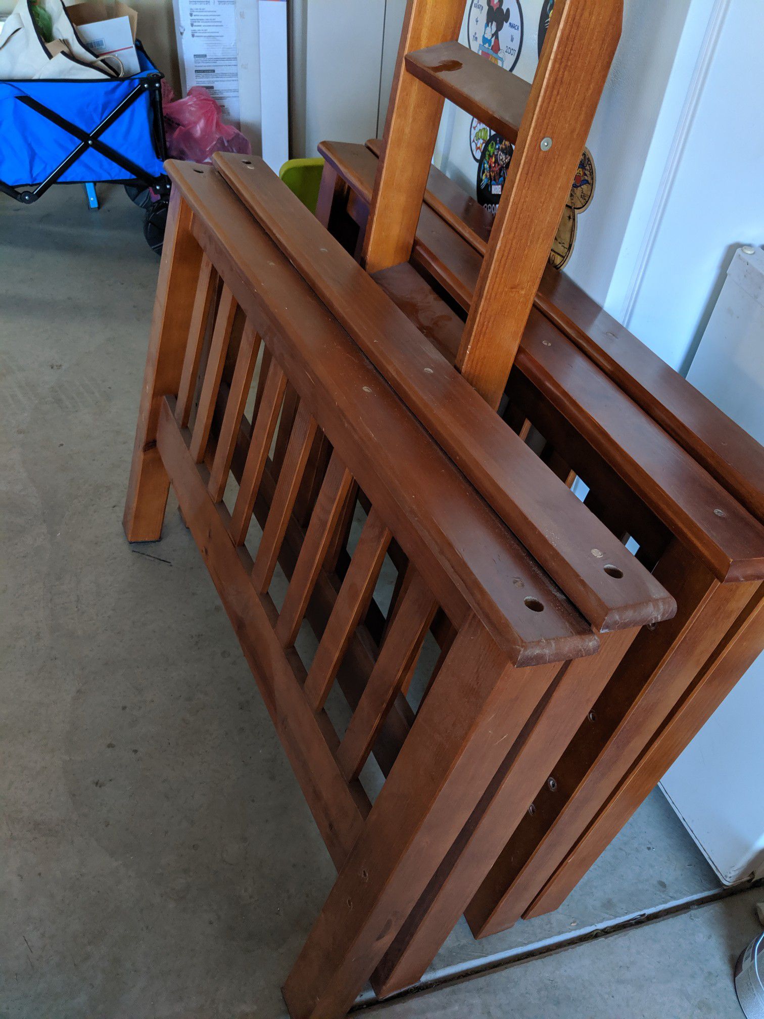 Twin bunk beds with a twin trundle bed. Good condition, top railing has some wear.