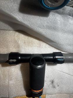 Segway Ninebot replacement handlebar assembly includes grips, throttle, and a dashboard for ES1, ES2, ES3, or ES4 models.