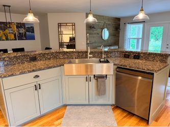 Kitchen island, Kohler sink and faucet, LG dishwasher, lighting, and more